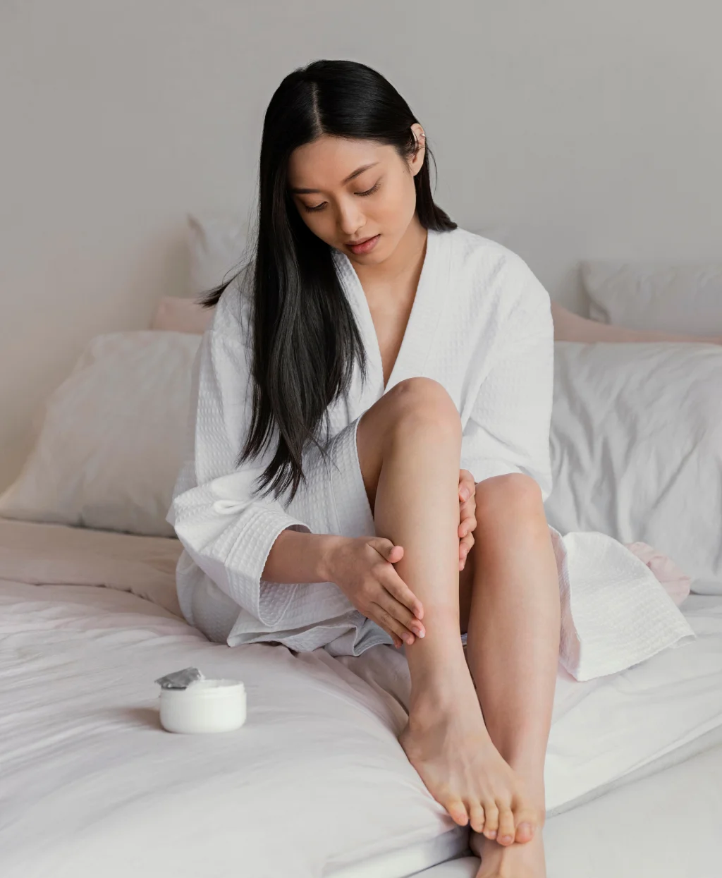 Woman applying skincare